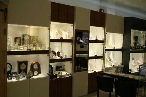 Pointing-And Walnut Display Cabinets